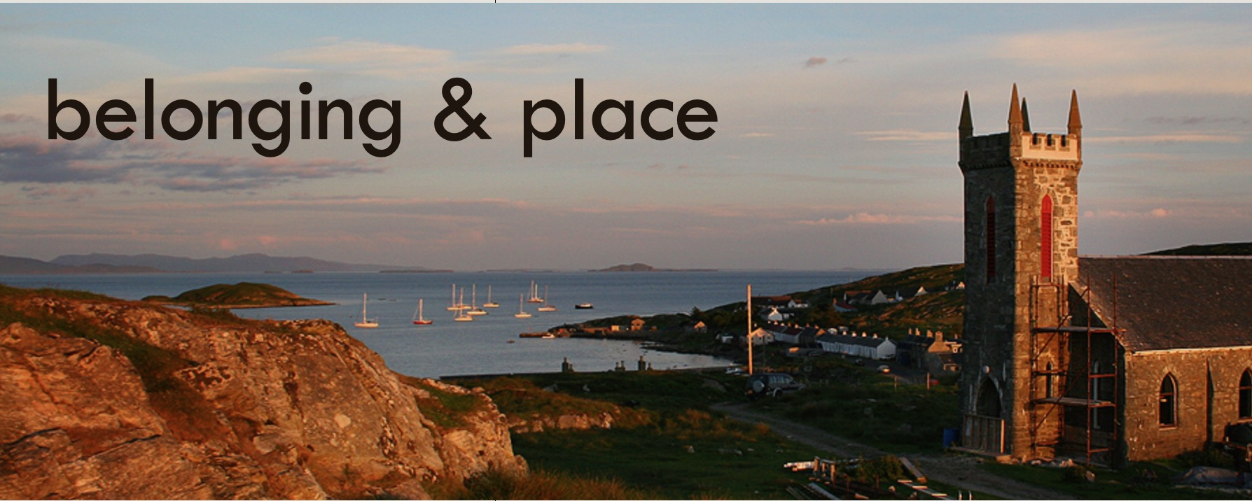 This is an image of a harbour in Scotland on the Island of Coll. There is a church on the right of the image. The sun is just setting in the image. https://commons.wikimedia.org/wiki/File:Coll.jpg